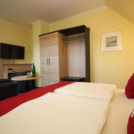 Hotel Morgensonne Garni Busum Bagian luar foto